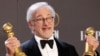 Steven Spielberg poses with his awards for Best Director in a Motion Picture and Best Picture Drama for "The Fabelmans" at the 80th Annual Golden Globe Awards in Beverly Hills, California, U.S., Jan. 10, 2023. 