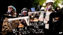 Black Lives Matter protesters march through Portland, Ore., Aug. 2, 2020. 