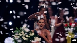 Camille Schrier, of Virginia, reacts as she is crowned after winning the Miss America competition at the Mohegan Sun casino in Uncasville, Conn., Dec. 19, 2019. 