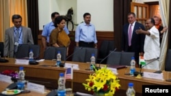 U.S. Defense Secretary Leon Panetta (2nd R) is shown into a conference room by his Indian counterpart A.K. Antony (R) during a meeting in New Delhi, June 6, 2012. 
