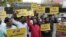 Supporters of the Aam Aadmi Party, or Common Man's Party, shout outside the office of India's ruling Bharatiya Janata Party in New Delhi, India, March 22, 2024. Anti-corruption crusader and AAP leader Arvind Kejriwal was arrested Thursday by the federal investigative agency.