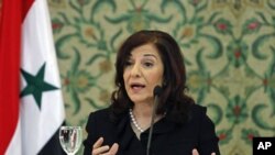 ນາງ Bouthaina Shaaban ທີ່ປຶກສາ ແລະໂຄສົກຂອງປະທານາທິບໍດີ
Bashar al-Assad ຂອງຊີເຣຍ ຜູ້ທີຖືກກັກຊັບສິນ ແລະຫ້າມປະກອບ ທຸລະກິດໃດໆ ໃນຈໍານວນບຸກຄົນສໍາຄັນ 3 ຄົນ ຂອງລັດຖະບານຊີເຣຍ