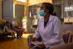 Mihira Redae, a social worker at Ayder Referral Hospital, helps the rape victims to seek treatment for wounds, diseases and psychological trauma, in Mekelle, Ethiopia, June 8, 2021 (Yan Boechat/VOA)