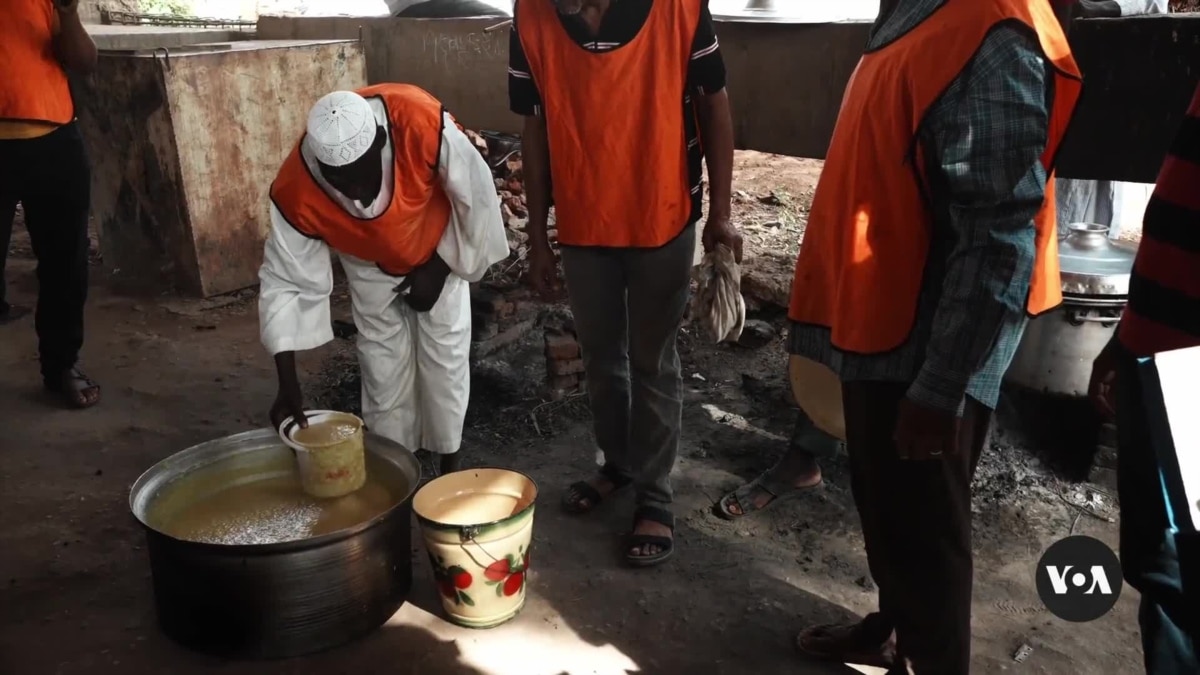 Community soup kitchens feed Sudan’s starving as aid access bloc