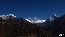 This photograph taken from a helicopter shows an aerial view of Mount Everest in Nepal's Solukhumbu district, some 140 kilometers (87 miles) northeast of Kathmandu, on Nov. 22, 2018. 