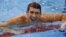 Michael Phelps of the U.S. smiles after winning the men's 4x200m freestyle relay final during the London 2012 Olympic Games at the Aquatics Centre July 31, 2012. 