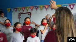 Ensayo del Coro Infantil Venezuela, en Caracas, diciembre de 2021. Foto: Adriana Nuñez Rabascall - VOA.