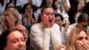 Dana Shem Tov, sister of Israeli hostage Omer Shem Tov, reacts as she watches his televised release by Hamas militants at the family home in Tel Aviv on Feb. 22, 2025.