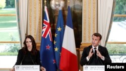 FILE - French President Emmanuel Macron and New Zealand's Prime Minister Jacinda Ardern hold a news conference during the "Christchurch Call Meeting" at the Elysee Palace in Paris, May 15, 2019. 