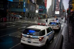 29일 미국 뉴욕 타임스퀘어에서 순찰하고 있는 경찰차.