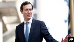 FILE— In this August 29, 2018 photo, White House Adviser Jared Kushner waves as he arrives at the Office of the United States Trade Representative in Washington.