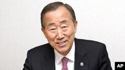 United Nations SecretaryGeneral Ban Ki-moon holds his smartphone in his hotel room in Brazilia, Brazil as he learns that the Security Council has voted to recommend him as a candidate for a second term