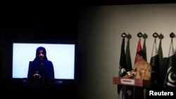 FILE - Noreen Leghari, a would-be Islamic State female suicide bomber, is seen in a video confession shown during a news conference by Maj. Gen. Asif Ghafoor, director general of Inter Services Public Relations in Rawalpindi, Pakistan, April 17, 2017.