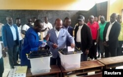 Gabonese President Ali Bongo Ondimba casts his vote at a polling station during the presidential election in Libreville, Gabon August 26, 2023