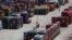 FILE - Shipping containers are stacked for storage at Wando Welch Terminal operated by the South Carolina Ports Authority in Mount Pleasant, South Carolina, U.S., May 10, 2018.