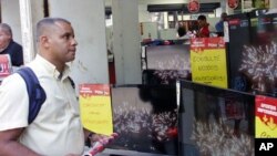 Ronaldo Ormond Silva shops for a TV in Rio de Janeiro. He's one of many Brazilians who have eagerly embraced consumerism under the presidency of Luiz Inacio Lula da Silva