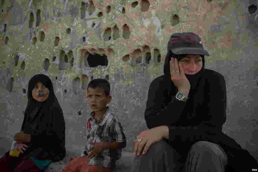 Children who live at the Ain Issa Camp spend the day playing around the tents. There is not enough space in the schools to accommodate all of them, Sept. 1, 2019. (Yan Boechat/VOA)