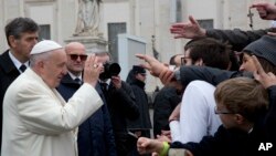 Pope Francis blesses faithful during his weekly general audience, in St. Peter's Square, at the Vatican, Feb. 14, 2018.