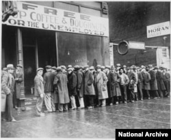 Unemployed men queued outside a depression soup kitchen opened in Chicago, Feburary 1931