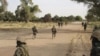 FILE - Nigerien soldiers patrol at the border with Nigeria, March 25, 2015. Nigerian defense officials warned Nov. 7, 2024, that a new insurgent group has infiltrated the country's northwestern region after Niger’s 2023 coup joint disrupted military patrols along the border.