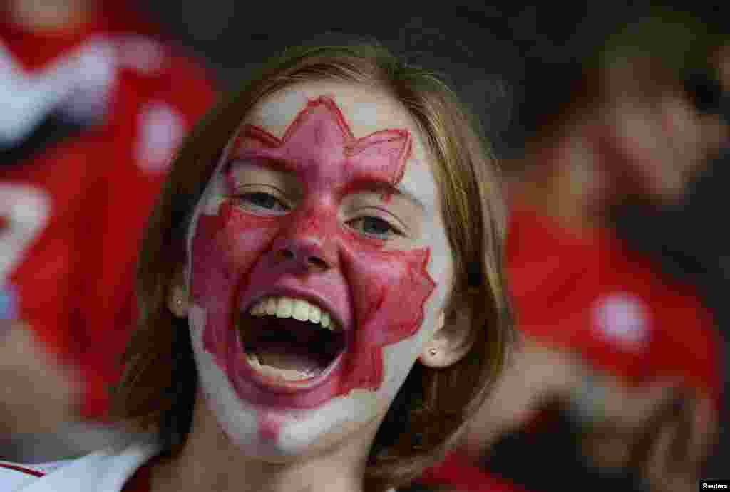 A Canada fan reacts ahead of their women's Group F football match against Sweden at the London 2012 Olympic Games at St James' Park in Newcastle, northern England July 31, 2012. 