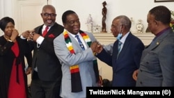 UMongameli Emmerson Mnangagwa esamukela ababengamalunga eMDC, uMnu. Obert Gutu loMnu. James Makore.