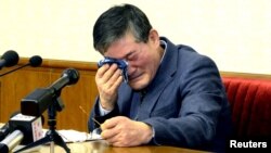FILE - A man who identified himself as Kim Dong Chul, a naturalized American citizen, was arrested in North Korea in October. He attends a news conference in Pyongyang, North Korea, in this undated photo.
