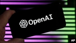 FILE - The logo for OpenAI, the maker of ChatGPT, appears on a mobile phone, in New York, Jan. 31, 2023.