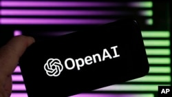 The logo for OpenAI, the maker of ChatGPT, appears on a mobile phone, in New York, Jan. 31, 2023.