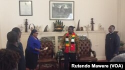 Sachigaro weZEC Amai Priscilla Chigumba nemutungamiri wenyika VaEmmerson Mnangagwa