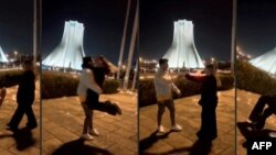 Kombinasi potongan gambar yang diambil dari sebuah video yang menunjukkan Astiyazh Haghighi dan tunangannya Amir Mohammad Ahmadi berdansa di depan Menara Azadi di Teheran. Kedua kini telah dipenjara akibat video dansa mereka yang viral tersebut. (Foto: AFP/ESN/Hengaw)