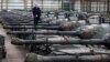 Belgian Arms Trader, Defense Minister Tangle Over Tanks for Ukraine 