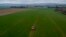 FILE - A farmer fertilizes a field on the outskirts of Frankfurt, Germany, April 4, 2022. Russia's war in Ukraine pushed up fertilizer prices but they have come down since their peak in mid-2022.