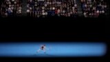Elena Rybakina of Kazakhstan plays a backhand return to Victoria Azarenka of Belarus during their semifinal match at the Australian Open tennis championship in Melbourne, Australia, Jan. 26, 2023.