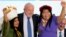 FILE - New Minister of Indigenous Peoples Sonia Guajajara, left, Brazil's President Luiz Inacio Lula da Silva, center, and new President of the National Foundation of the Indian Joenia Wapichana, celebrate during their inauguration, in Brasilia, Brazil, Jan. 11, 2023.