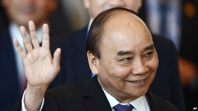 FILE - Vietnam's President Nguyen Xuan Phuc arrives at the APEC Economic Leaders Meeting during the Asia-Pacific Economic Cooperation, also known as APEC summit, Nov. 19, 2022. (AP)