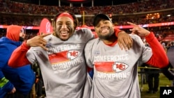 Kansas City Chiefs safety Justin Reid, left, and Chiefs safety Juan Thornhill, right, celebrate after they beat the Cincinnati Bengals in the NFL AFC Championship playoff football game, Jan. 29, 2023 in Kansas City, Missouri.