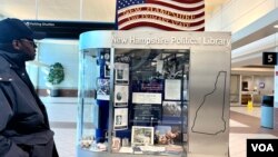 A display in Manchester's airport promotes New Hampshire's first-in-the-nation presidential primary tradition. (Steve Herman/VOA) 