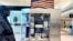 A display in Manchester's airport promotes New Hampshire's first-in-the-nation presidential primary tradition. (Steve Herman/VOA) 
