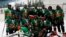 FILE - Kenya's national ice hockey team pose for a group photograph after a friendly tournament against the Chicago Cheetah team from the U.S. at the Panari Ice Skating Rink in Nairobi, Kenya, Jan. 7, 2023. 