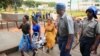 Opposition party Citizens Coalition for Change supporters arrive at the magistrate court for a hearing after they were arrested for unlawful gathering with intent to incite public violence in Harare, Zimbabwe, Jan. 16, 2023. 