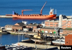 FILE - Russian roll-on/roll-off container carrier 'Lady R' docks at Simon's Town Naval Base, in Cape Town, South Africa, Dec. 7, 2022.