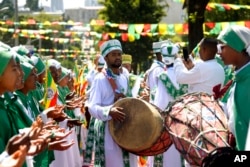 People celebrate Epiphany, a colorful festival celebrated all over Ethiopia to commemorate the baptism of Jesus Christ by John the Baptist in the River Jordan, in Addis Ababa, Ethiopia, Jan. 18, 2023.