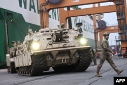 FILE - A M1A2 Abrams battle tank of the US army that will be used for military exercises by the 2nd Armored Brigade Combat Team, is pictured at the Baltic Container Terminal in Gdynia on December 3, 2022.