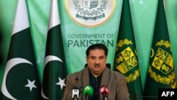 Pakistan's Energy Minister Khurram Dastgir speaks at a press briefing following a nationwide power outage, in Islamabad, Jan. 24, 2023.