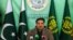 Pakistan's Energy Minister Khurram Dastgir speaks at a press briefing following a nationwide power outage, in Islamabad, Jan. 24, 2023.