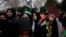 A woman holds a copy of the Quran during a protest in Istanbul, Turkey, Jan. 29, 2023, following the burning of the Quran in Stockholm.