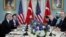 U.S. Secretary of State Antony Blinken, left, and Turkey's Foreign Minister Mevlut Cavusoglu, right, meet at the State Department in Washington, Jan. 18, 2023.