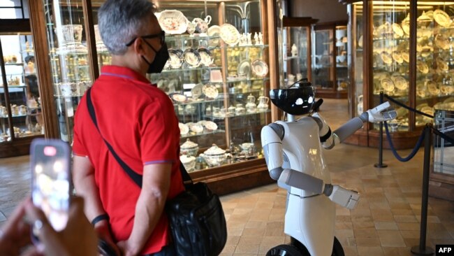 FILE - A photo shows the robot R1, designed by the Italian Institute of Technology, guiding tourists at the Palazzo Madama museum in Turin, May 12, 2021. The U.S. and European Union on Jan. 27, 2023, announced an agreement to speed up and enhance the use of AI.