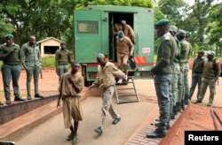 Members of the opposition party Citizens Coalition for Change (CCC) arrive at the Magistrates court after being arrested on charges of unlawful gatherings and inciting violence in Harare, Zimbabwe January 17,2023. REUTERS/Philimon Bulawayo